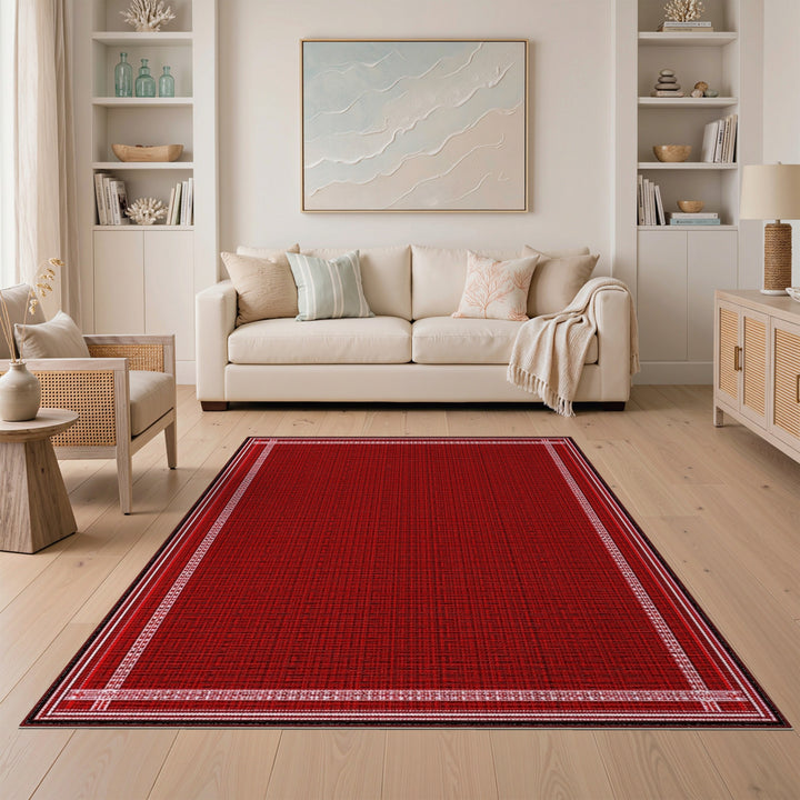 Red Area Rug with White Geometric Border