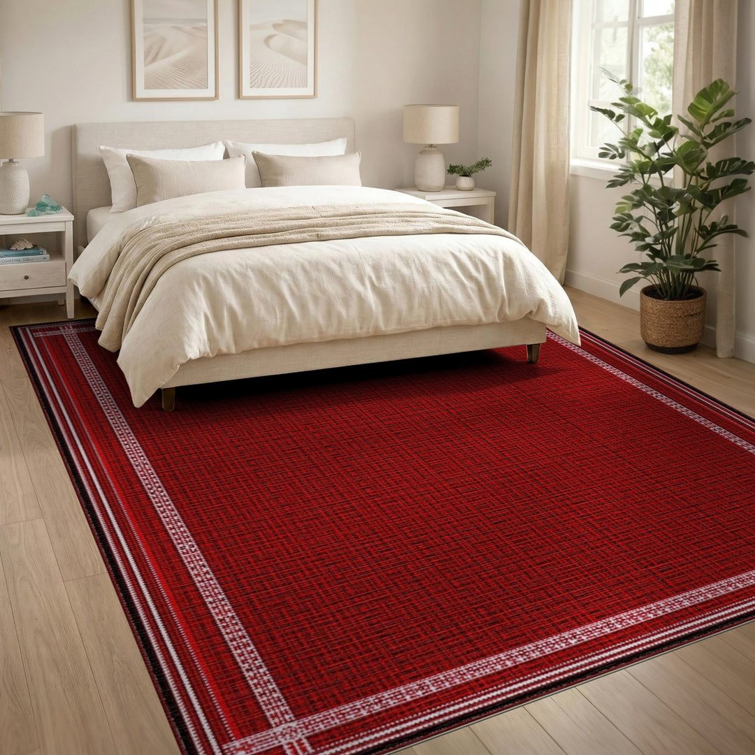 Red Area Rug with White Geometric Border