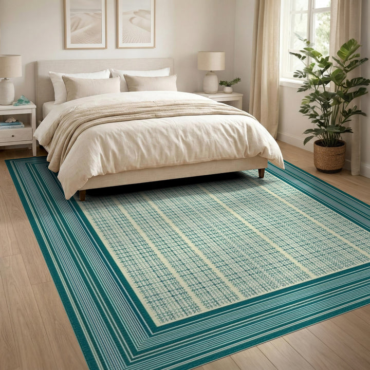 Blue and Teal Geometric Bordered Area Rug