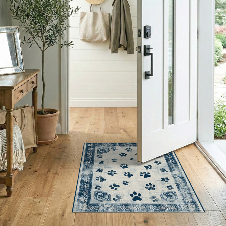 Blue and Teal Distressed Blue Paw Print Area Rug
