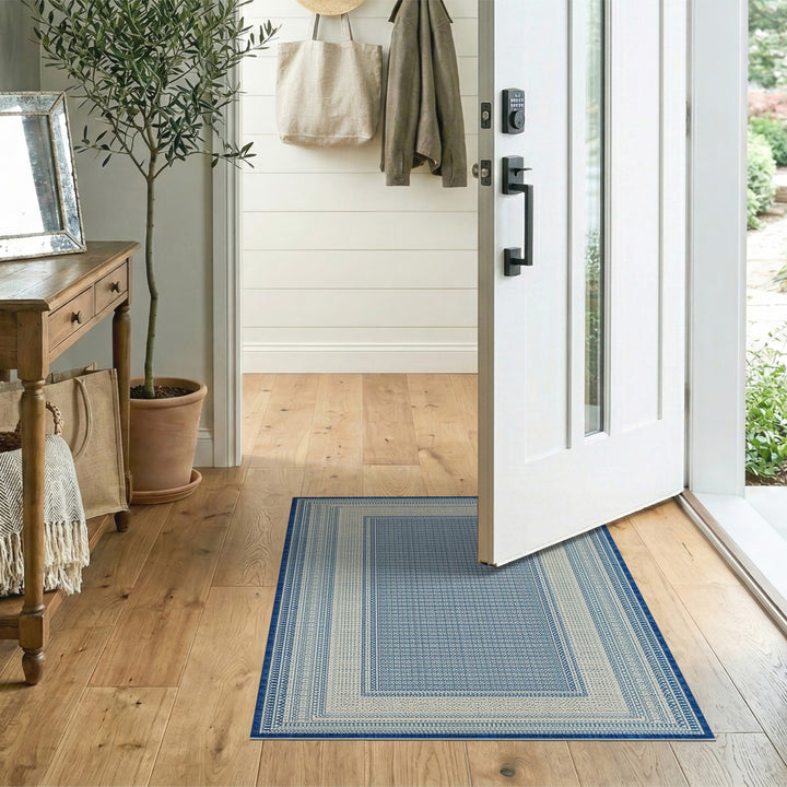 Blue Geometric Bordered Area Rug