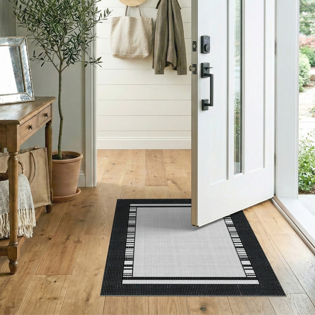 Black White Geometric Border Area Rug