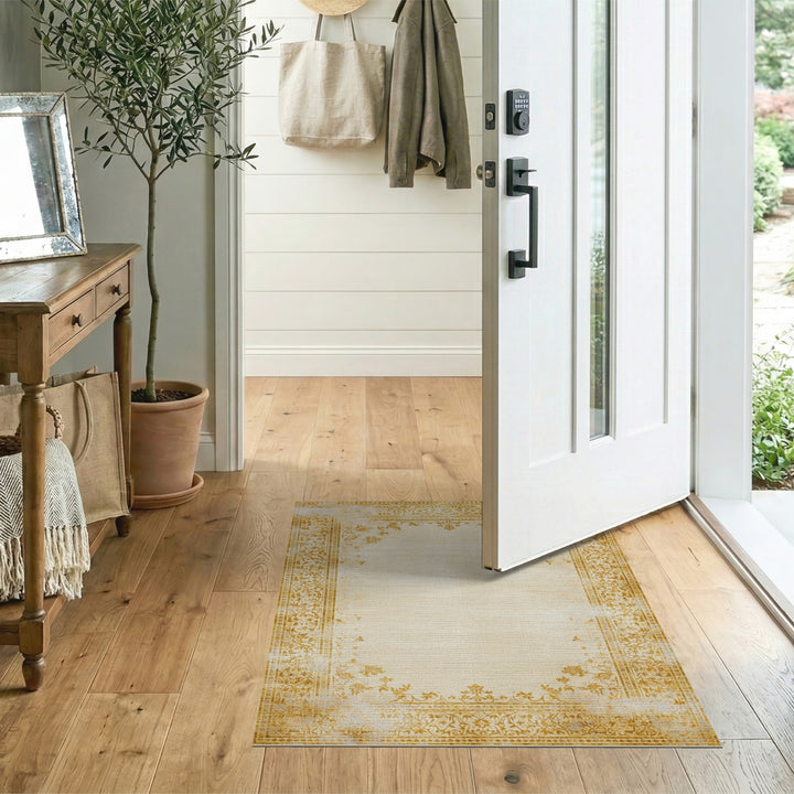 Beige and Neutral Beige Distressed Vintage Floral Area Rug