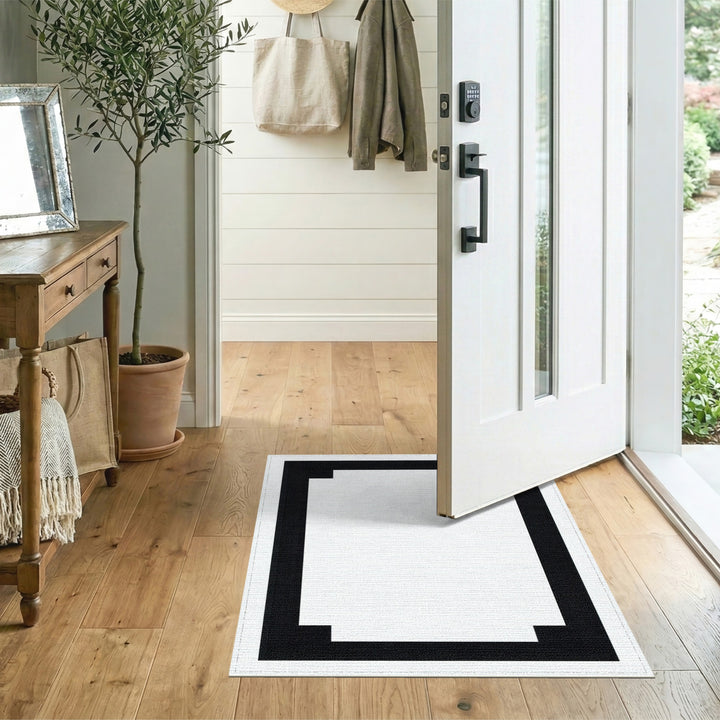 Black White Geometric Step Border Rug