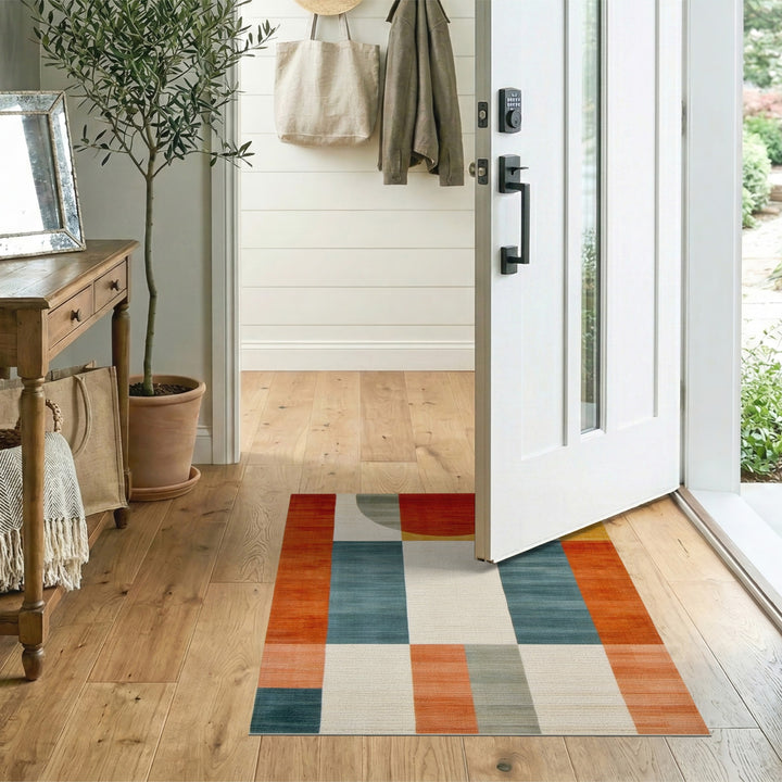 Bold Geometric Area Rug with Red Circle Motif