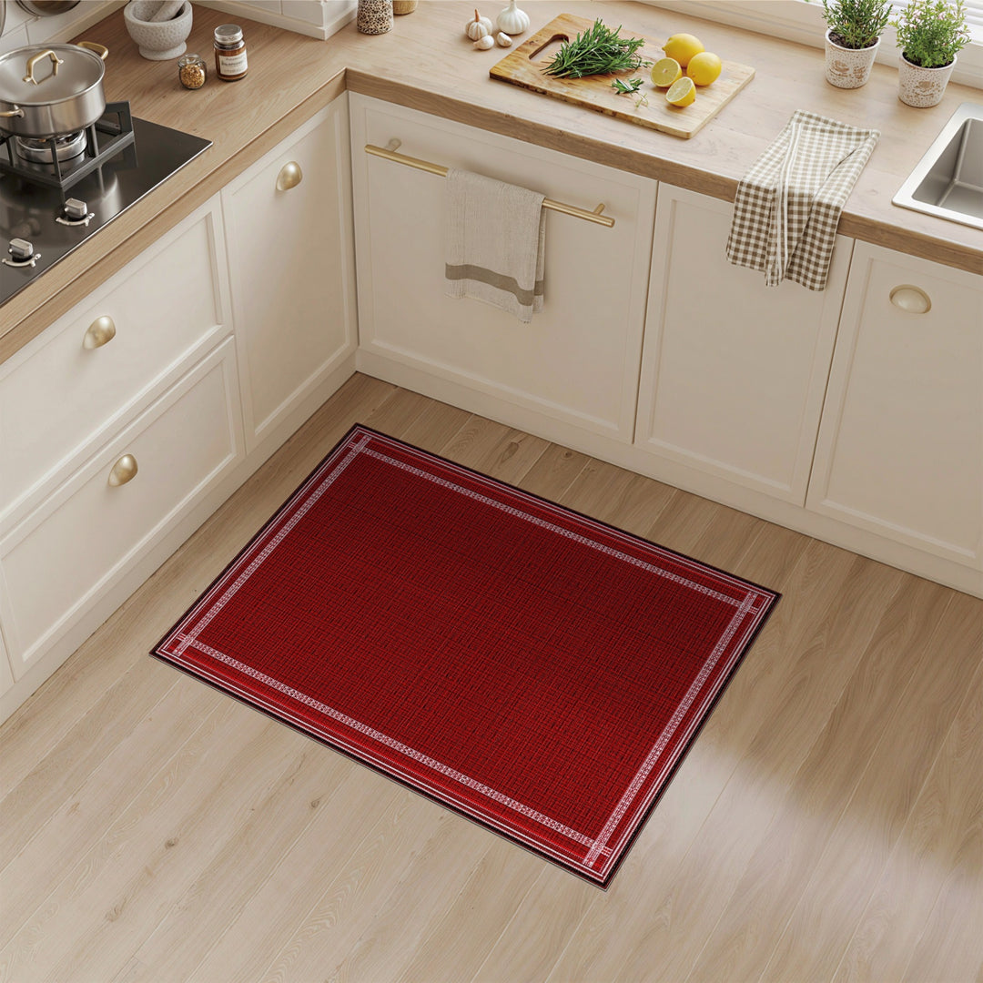 Red Area Rug with White Geometric Border