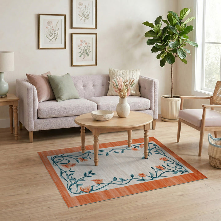 Beige Floral Vine Area Rug with Teal Border