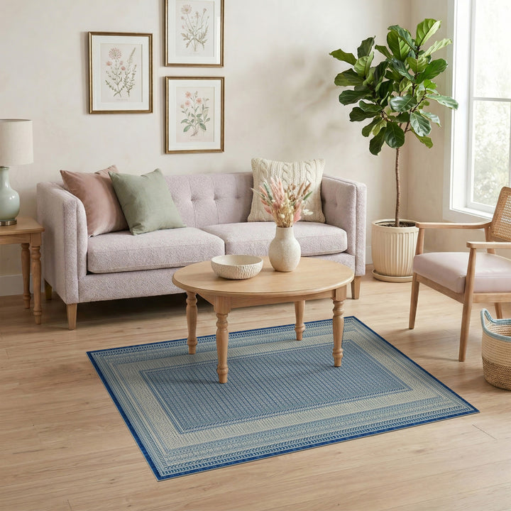 Blue Geometric Bordered Area Rug