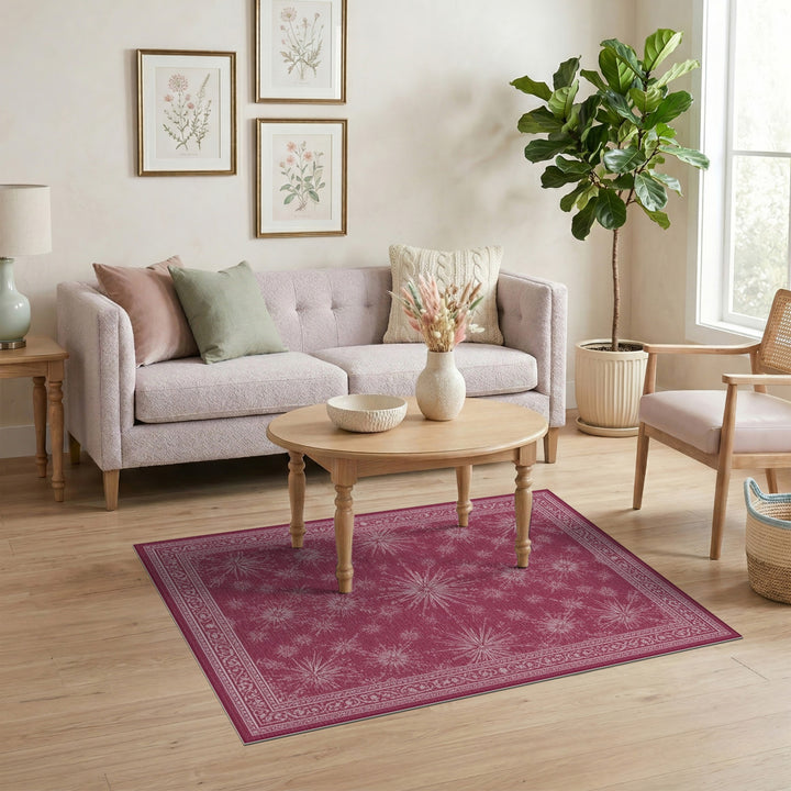 Pink Starburst Area Rug with Ornate Border