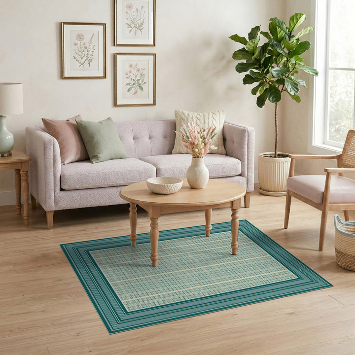 Blue and Teal Geometric Bordered Area Rug