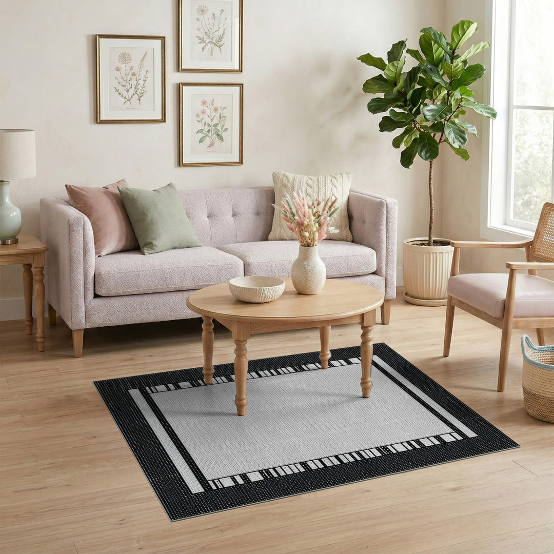 Black White Geometric Border Area Rug
